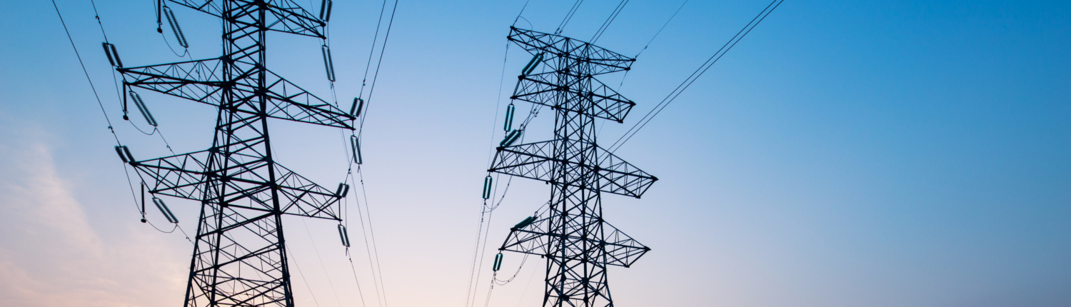 pylons in blue sky at sunrise